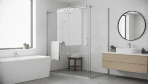 Modern bathroom with frameless sliding glass shower doors and minimalist fixtures.
